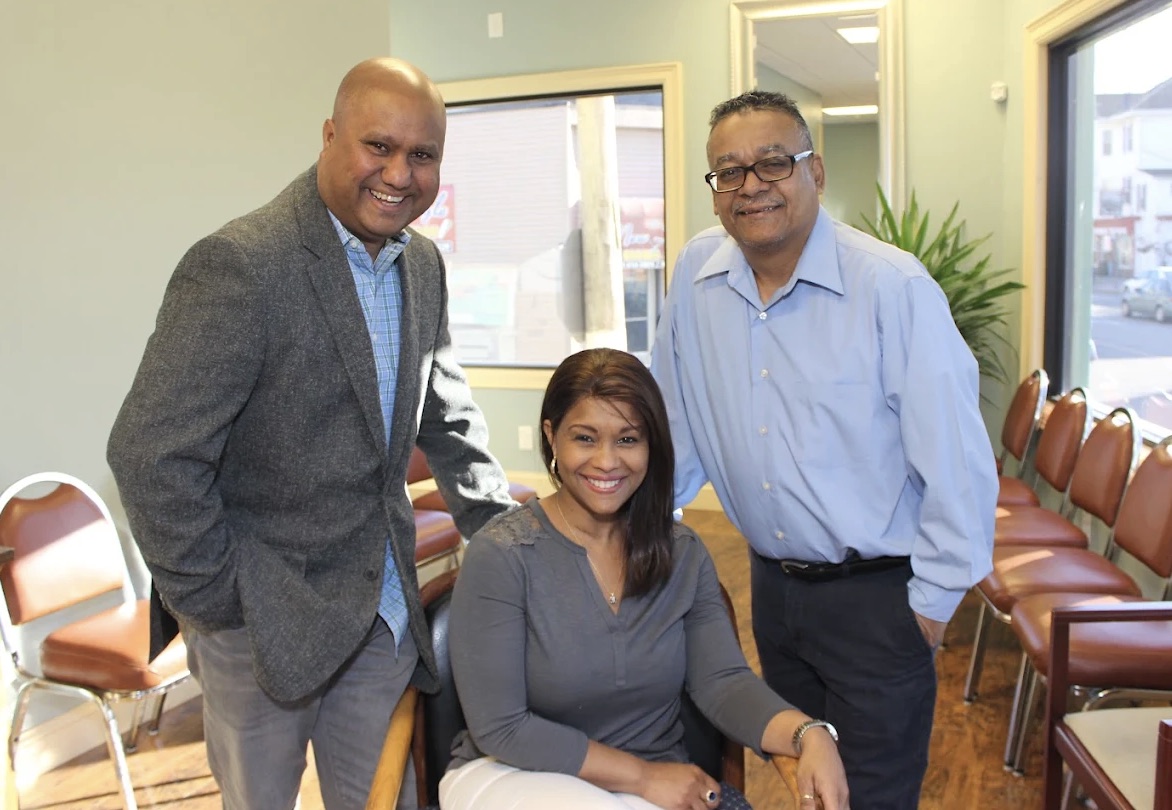 Alonso Mora, Roman Santana, Norkys Mora and Adrian Mora — the Professional Multiservices team — at their office in Providence, Rhode Island